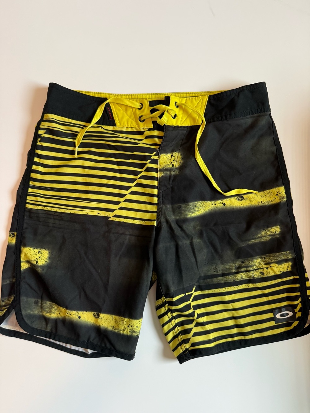 Oakley Men’s Black and Yellow Striped Board Shorts